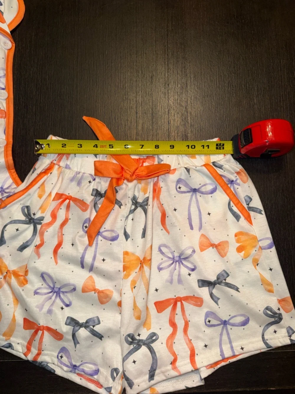 Primark White Elastic Waistband Shorts with Orange and Purple Star Print